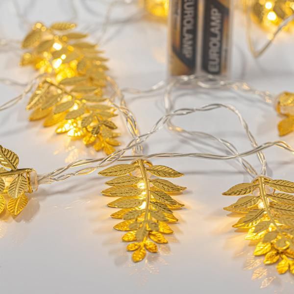 ΣΕΙΡΑ, 10 LED 5mm, ΜΕΤΑΛΛΙΚΑ ΧΡΥΣΑ ΦΥΛΛΑ 6cm, ΜΠΑΤΑΡΙΑΣ 2xAA, ΧΡΟΝΟΔΙΑΚΟΠΤΗ, ΔΙΑΦΑΝΟ PVC ΚΑΛΩΔΙΟ, ΘΕΡΜΟ ΛΕΥΚΟ LED ΑΝΑ 10cm, ΠΡΟΕΚΤΑΣΗ ΠΑΡΟΧΗΣ 50cm, IP20 Eurolamp 600-11457